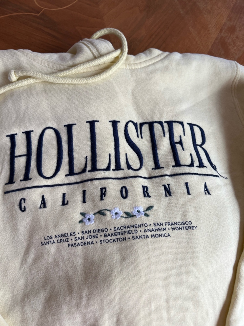 Hollister Pale Yellow Zip-Up Hoodie with Navy Logo